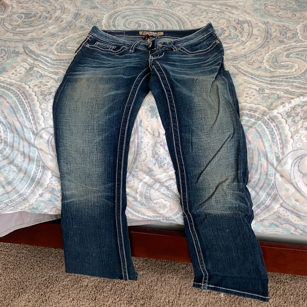 BKE distressed denim. Flapjack pockets. Boot cut low rise